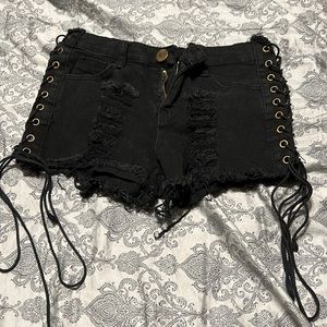 Black denim shorts lace up the sides, I got em off of Amazon